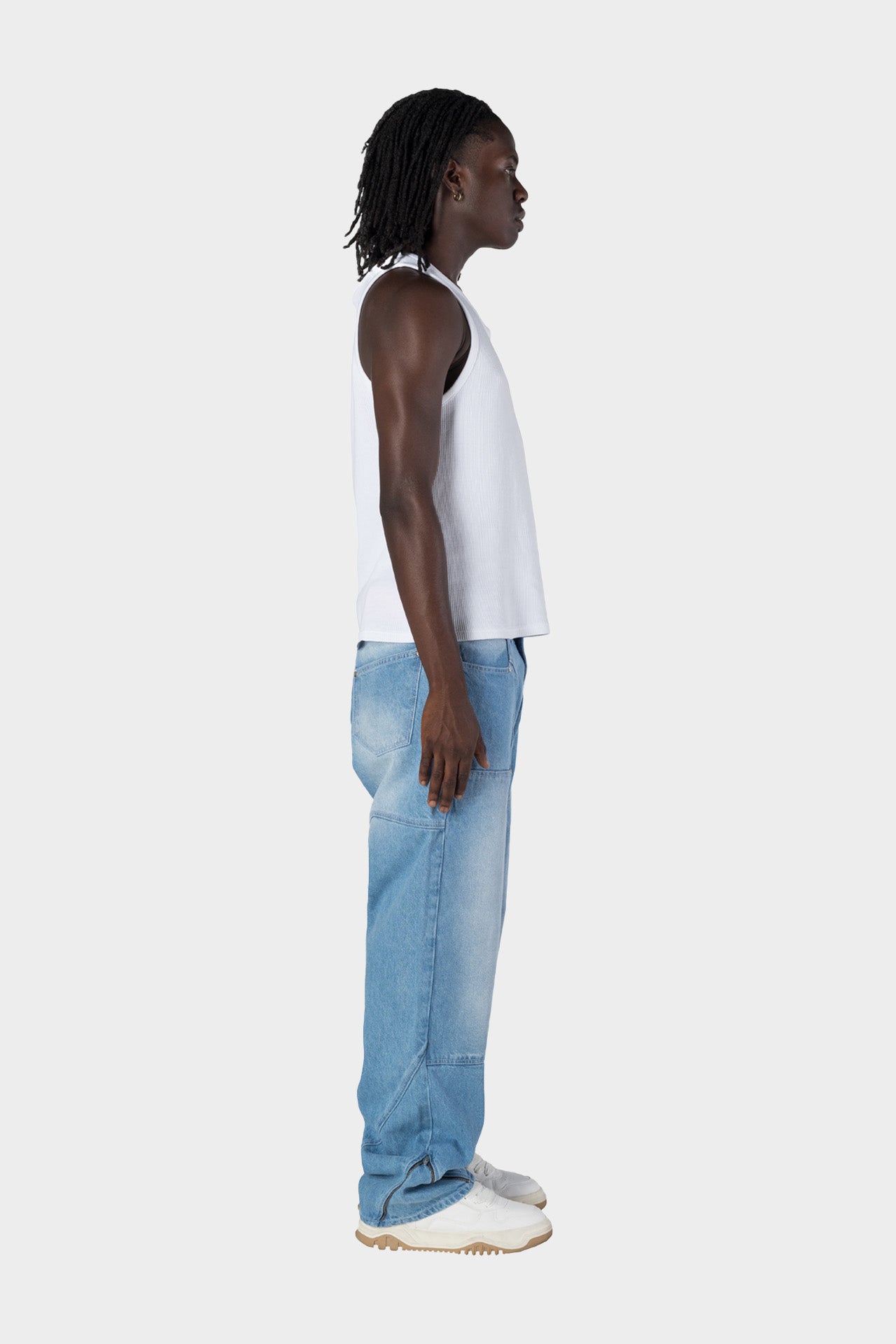 ASYMMETRICAL JEANS LIGHT BLUE