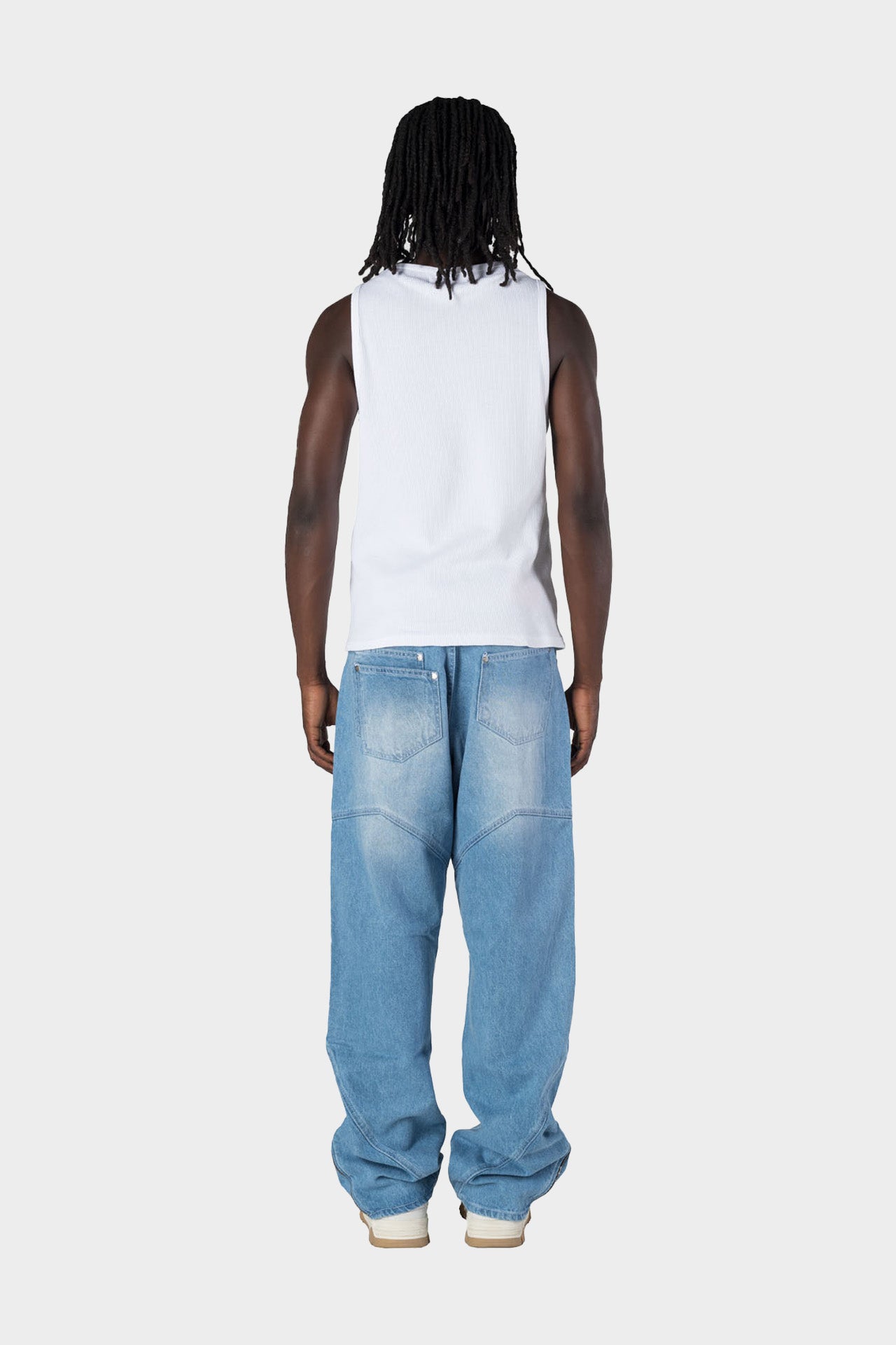 ASYMMETRICAL JEANS LIGHT BLUE